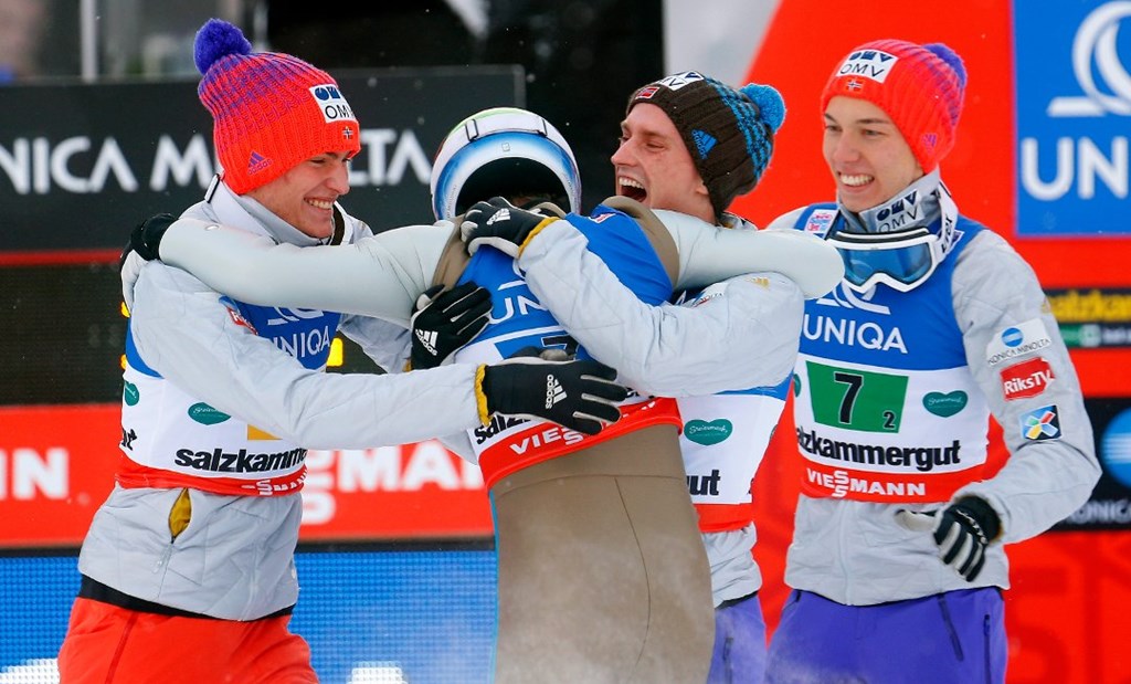 Kenneth Gangnes (2nd L) of Norway celebrates with his teammates Johann Andre Forfang (R), Daniel Andre Tande (L) and Anders Fannemel after winning the team event of the Ski Flying World Championships at Kulm hill in Bad Mitterndorf, Austria January 17, 2016.   REUTERS/Heinz-Peter Bader 